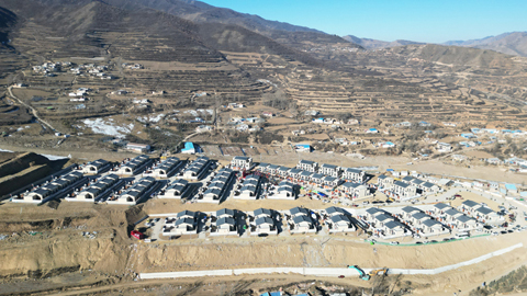 圖為航拍榆中縣舊莊溝村集中安置點(無人機照片)。(九美旦增 攝)